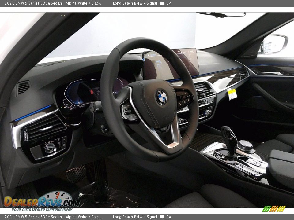Dashboard of 2021 BMW 5 Series 530e Sedan Photo #7