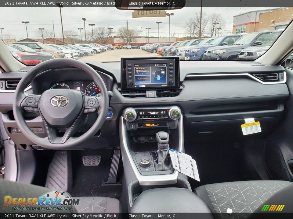 Dashboard of 2021 Toyota RAV4 XLE AWD Hybrid Photo #4