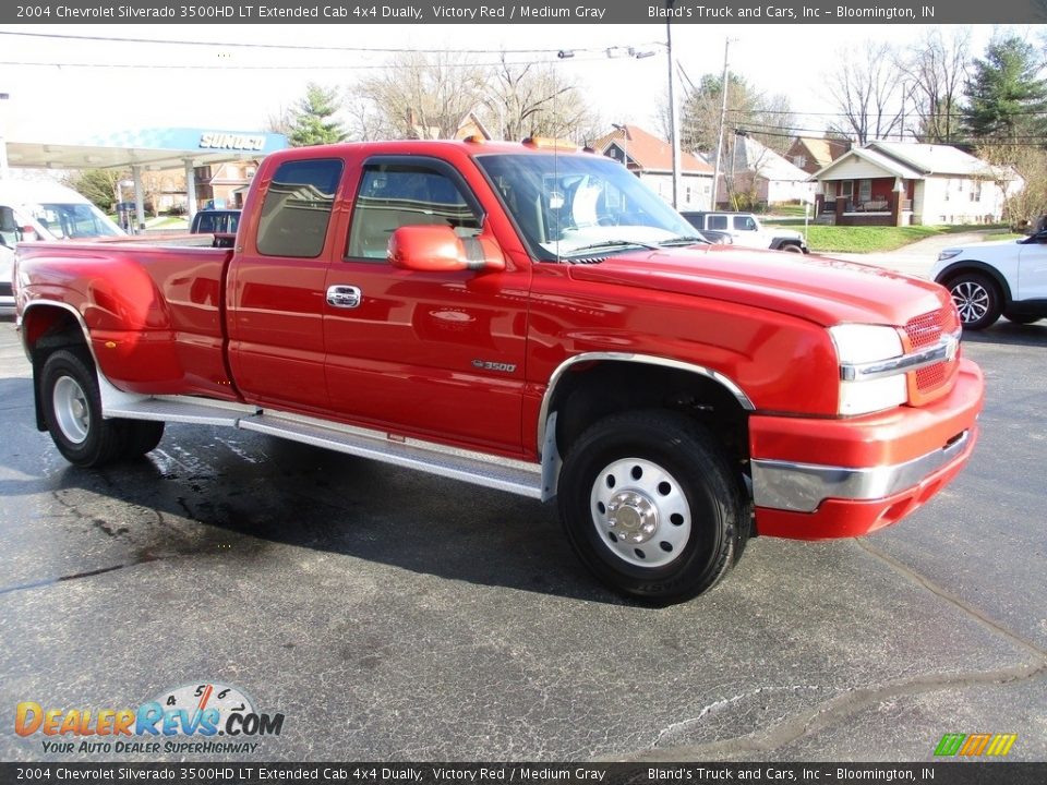 Front 3/4 View of 2004 Chevrolet Silverado 3500HD LT Extended Cab 4x4 Dually Photo #5