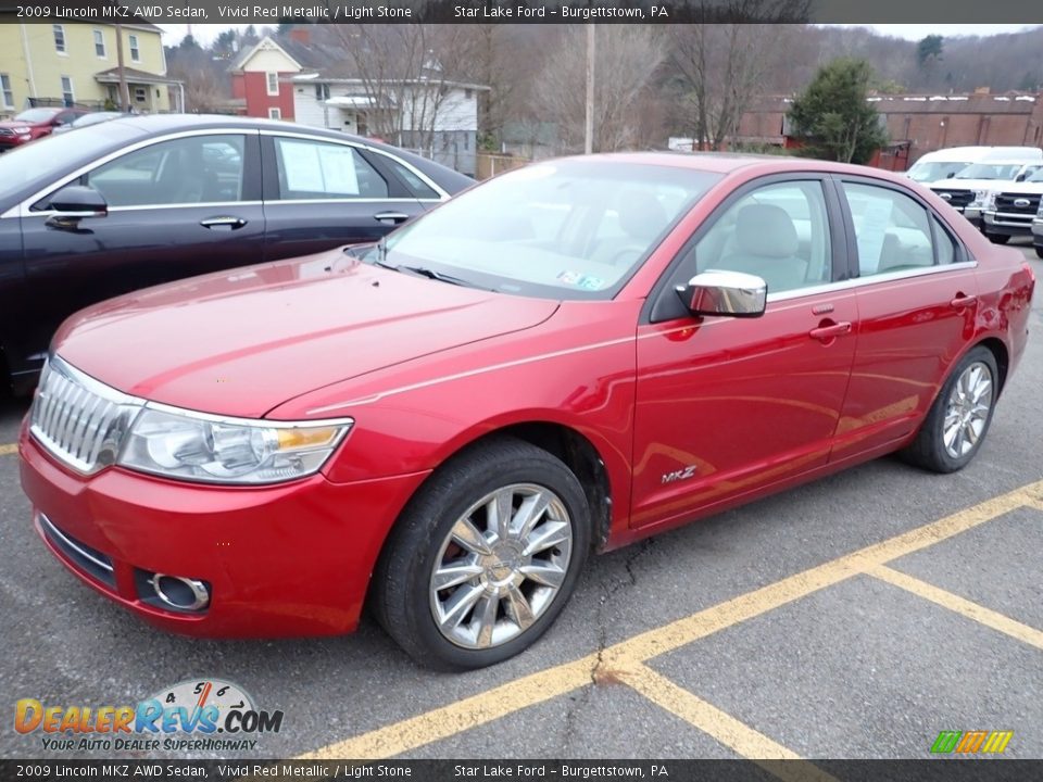 2009 Lincoln MKZ AWD Sedan Vivid Red Metallic / Light Stone Photo #1