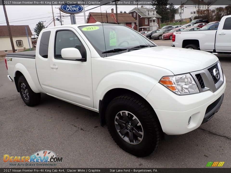 Front 3/4 View of 2017 Nissan Frontier Pro-4X King Cab 4x4 Photo #7