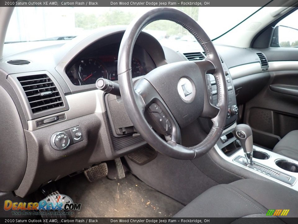 Dashboard of 2010 Saturn Outlook XE AWD Photo #9