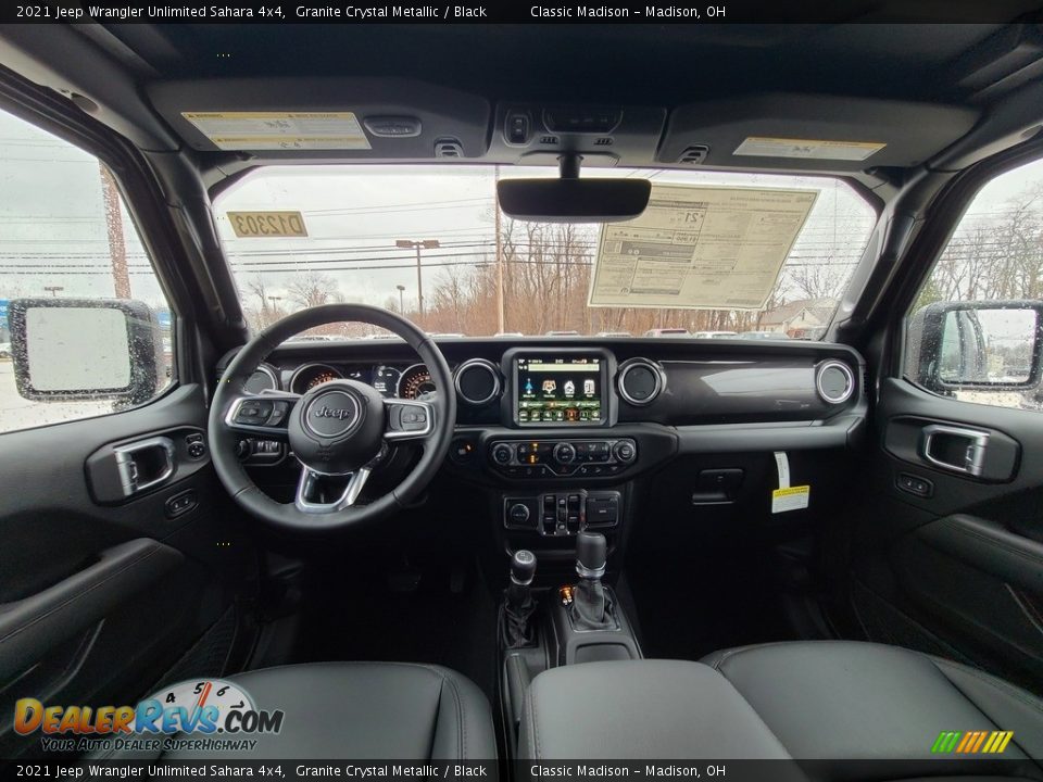 Dashboard of 2021 Jeep Wrangler Unlimited Sahara 4x4 Photo #4
