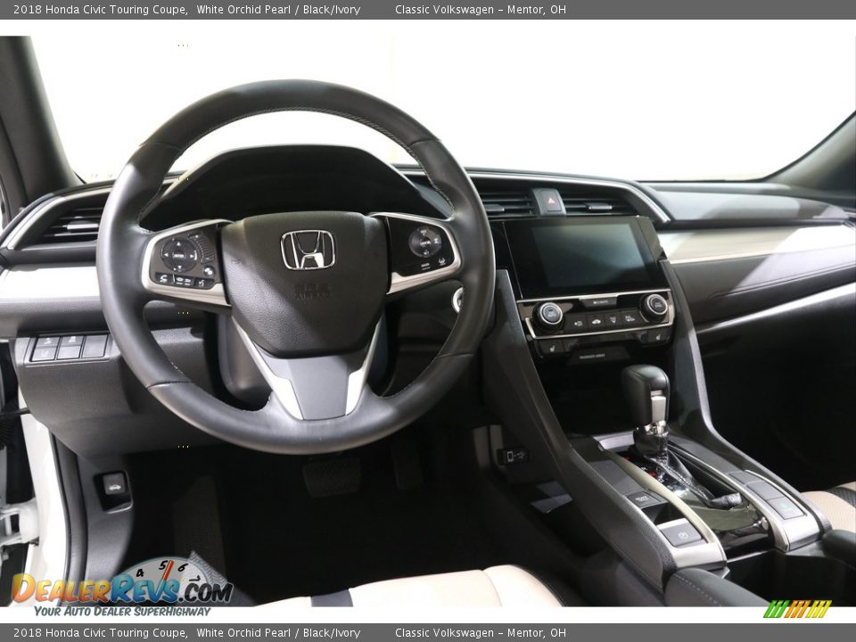 Dashboard of 2018 Honda Civic Touring Coupe Photo #6
