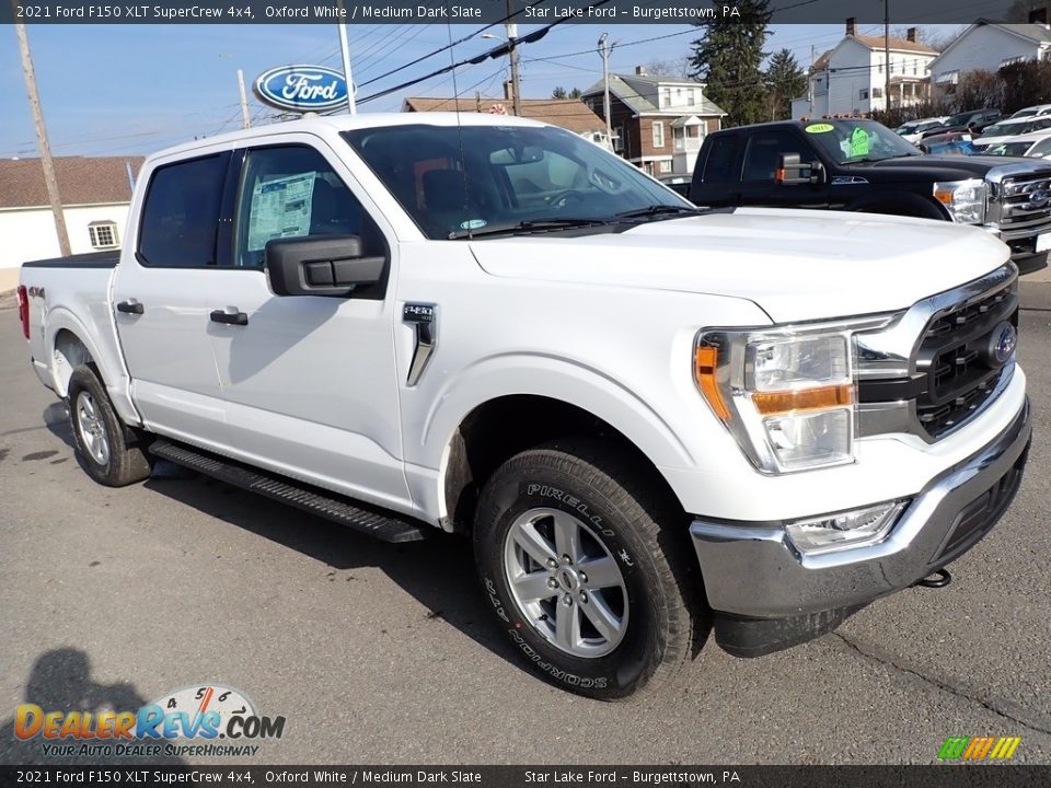 Front 3/4 View of 2021 Ford F150 XLT SuperCrew 4x4 Photo #7