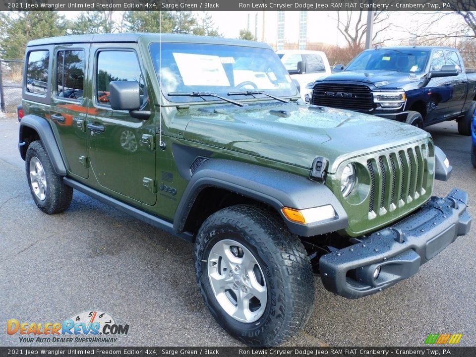 Front 3/4 View of 2021 Jeep Wrangler Unlimited Freedom Edition 4x4 Photo #3