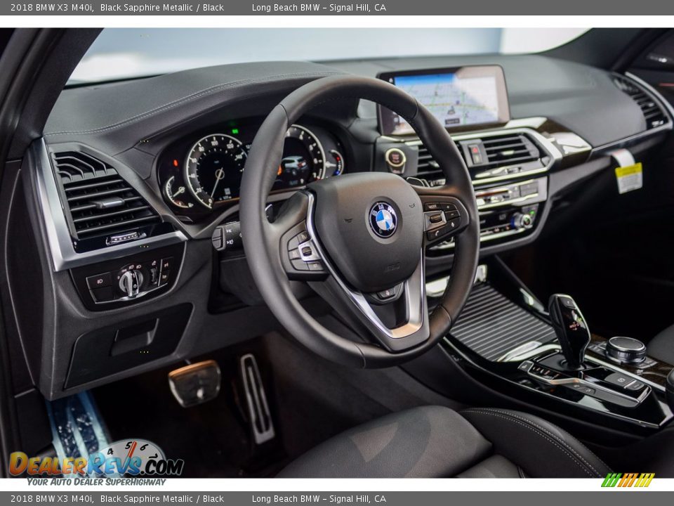 Dashboard of 2018 BMW X3 M40i Photo #6