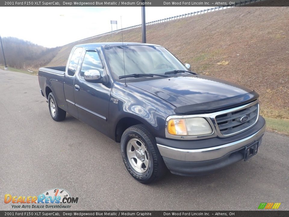 Front 3/4 View of 2001 Ford F150 XLT SuperCab Photo #2