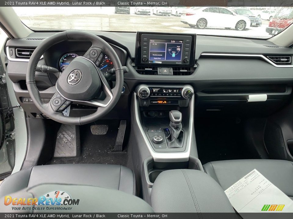 Dashboard of 2021 Toyota RAV4 XLE AWD Hybrid Photo #4
