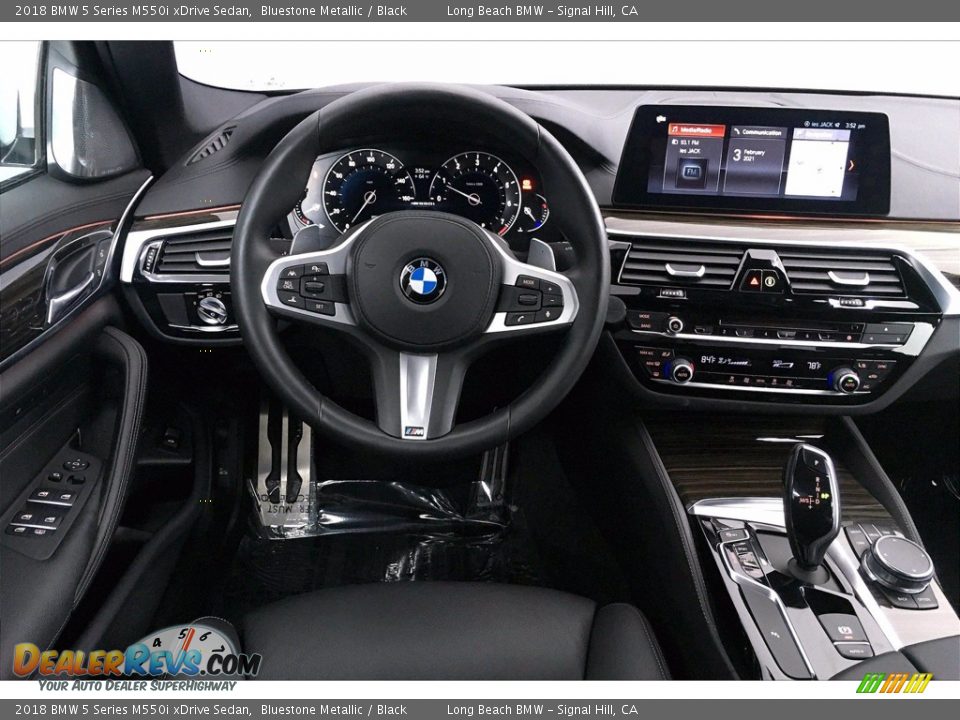Dashboard of 2018 BMW 5 Series M550i xDrive Sedan Photo #4