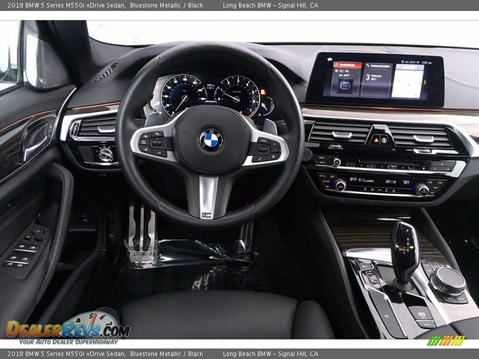 Dashboard of 2018 BMW 5 Series M550i xDrive Sedan Photo #4