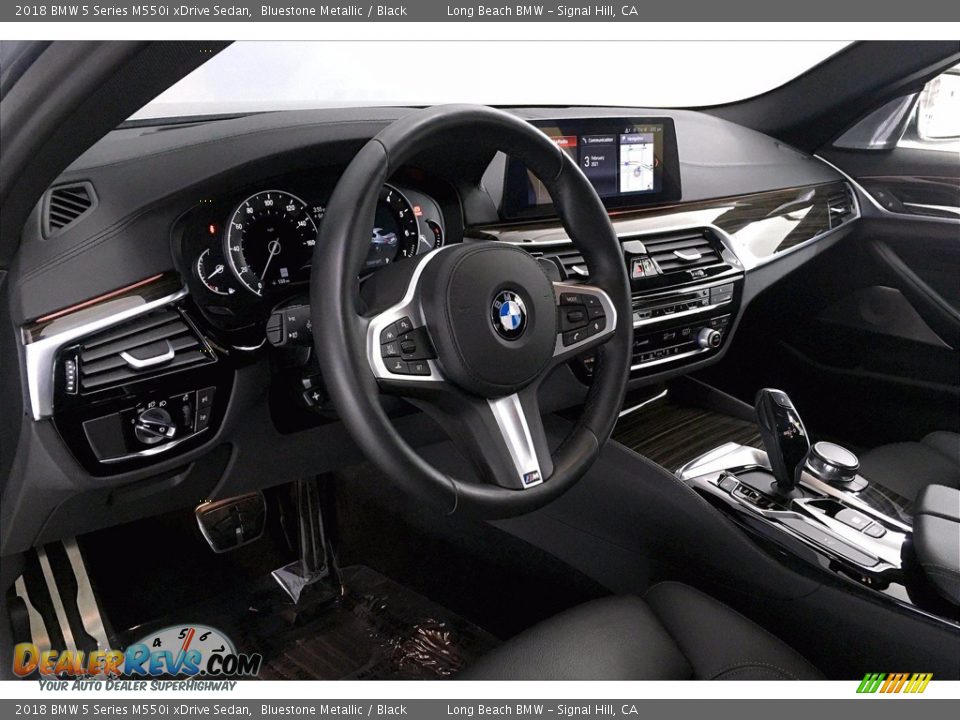 Dashboard of 2018 BMW 5 Series M550i xDrive Sedan Photo #21