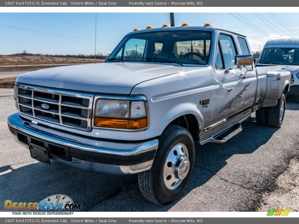 Front 3/4 View of 1997 Ford F350 XL Extended Cab Photo #8