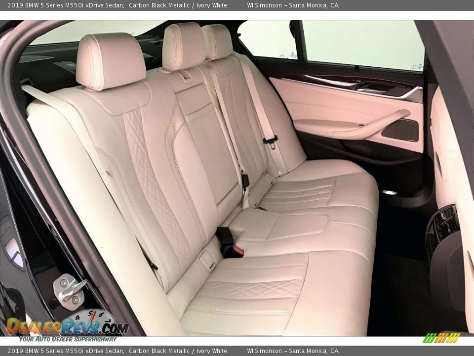 Rear Seat of 2019 BMW 5 Series M550i xDrive Sedan Photo #19