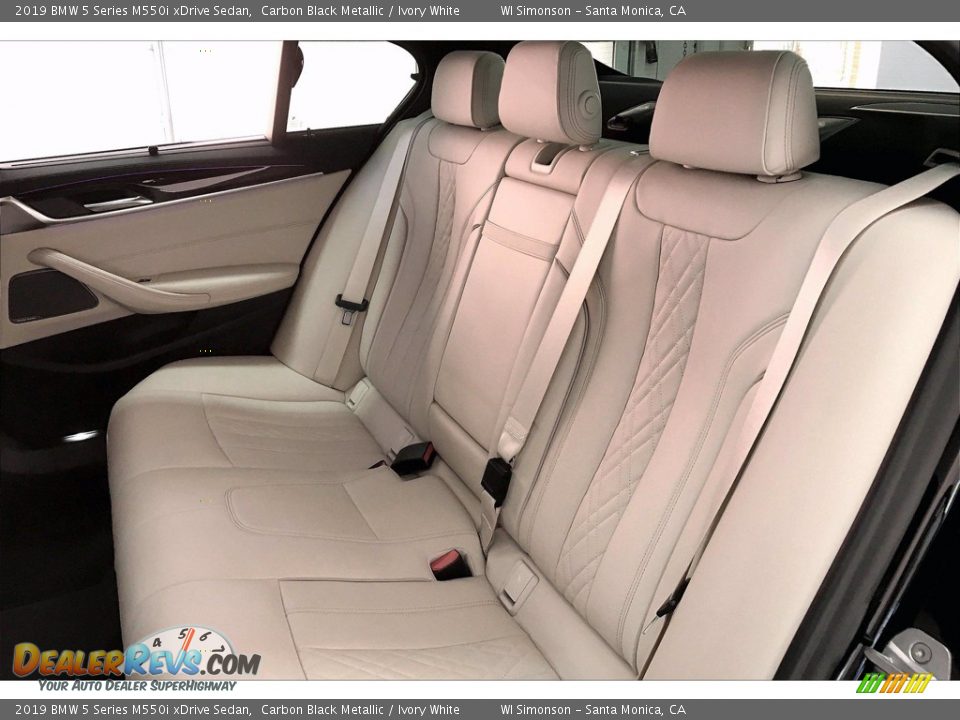 Rear Seat of 2019 BMW 5 Series M550i xDrive Sedan Photo #20