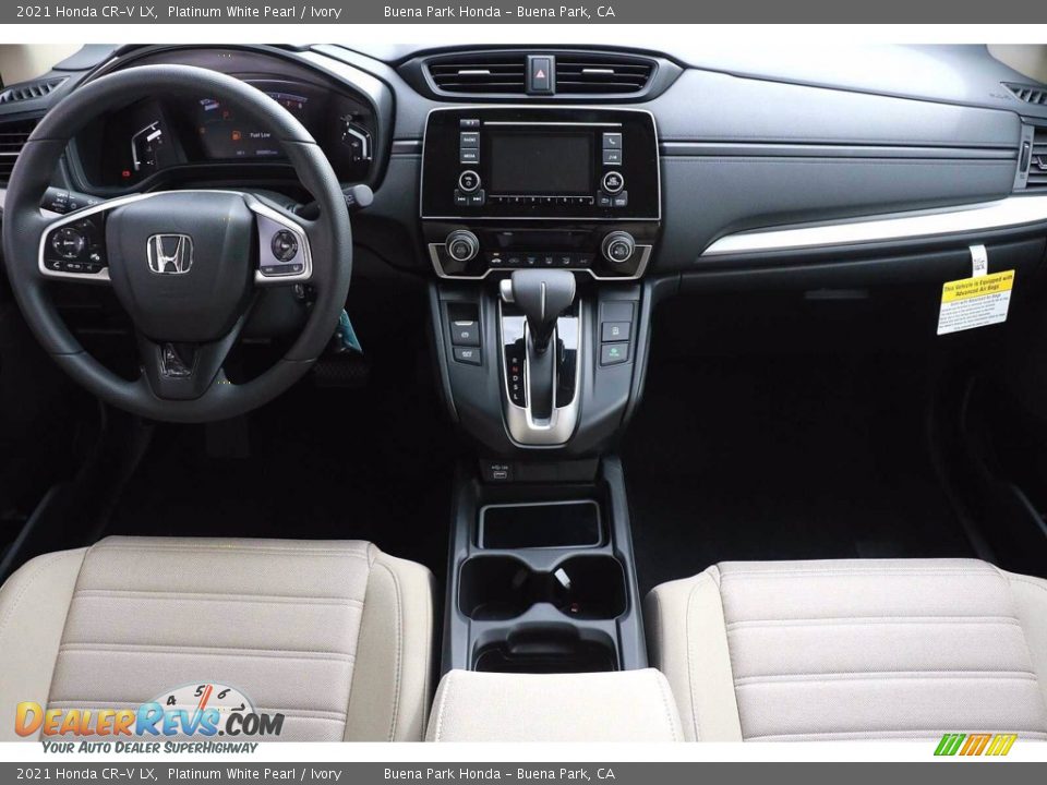 Dashboard of 2021 Honda CR-V LX Photo #11