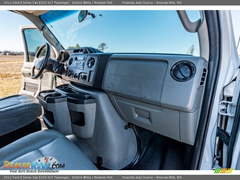 Dashboard of 2011 Ford E Series Van E150 XLT Passenger Photo #28