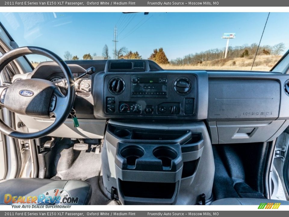 Dashboard of 2011 Ford E Series Van E150 XLT Passenger Photo #31