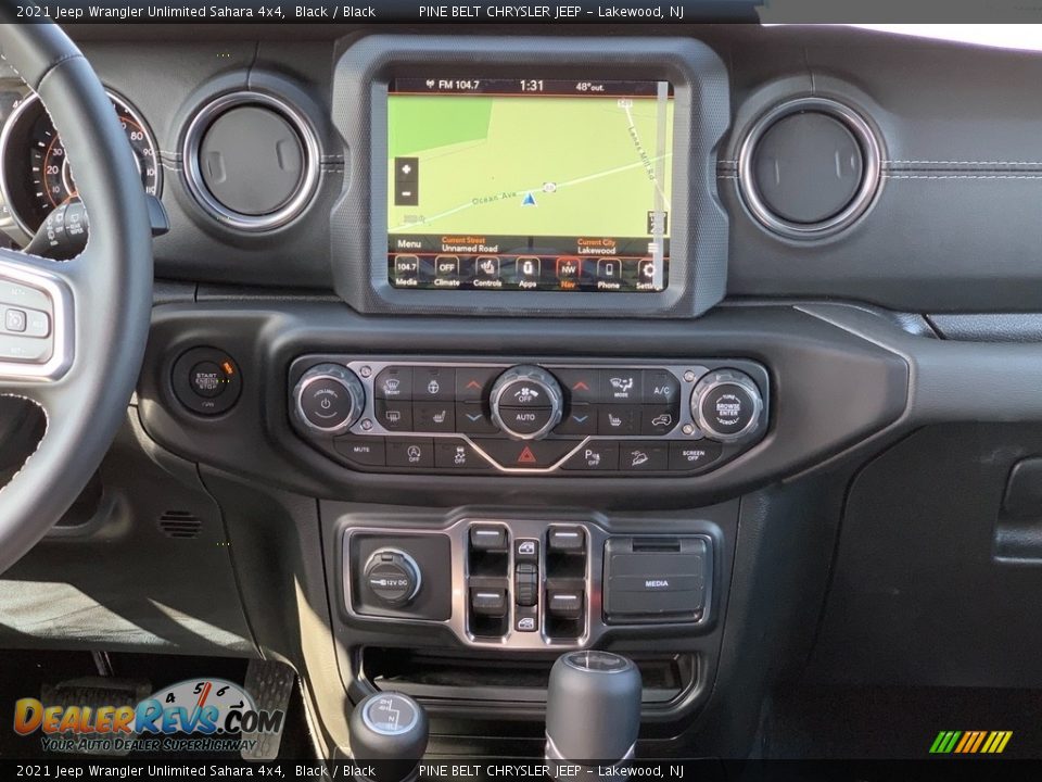 Dashboard of 2021 Jeep Wrangler Unlimited Sahara 4x4 Photo #11