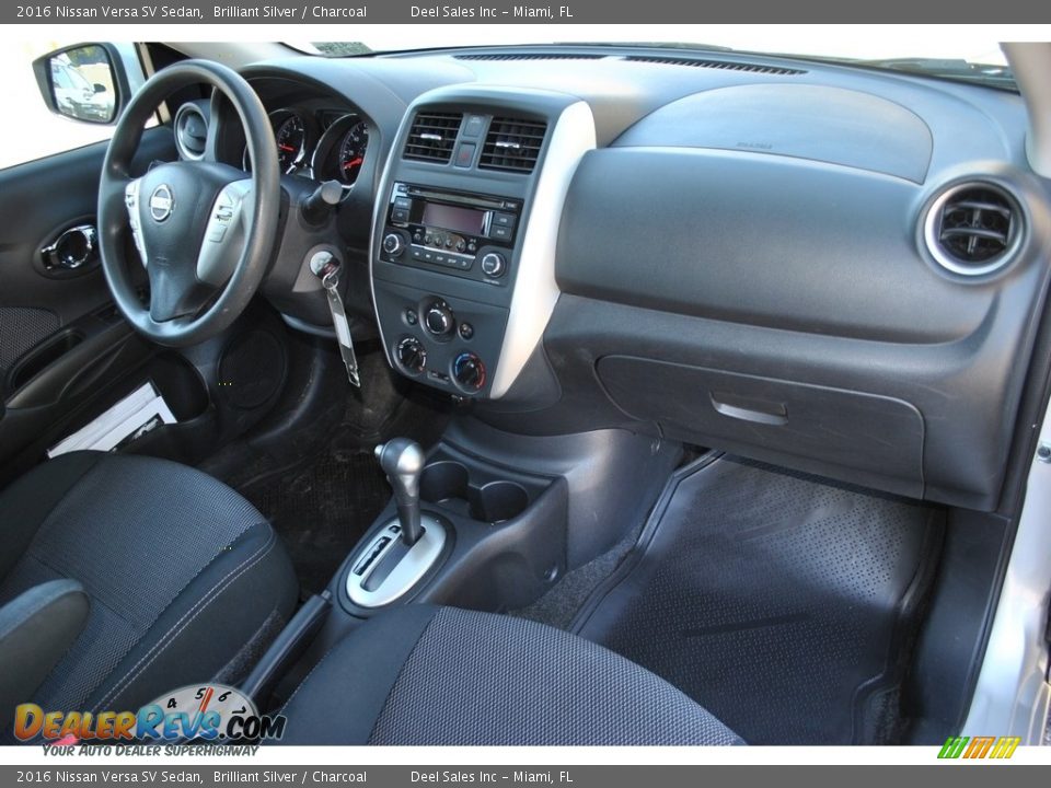 Dashboard of 2016 Nissan Versa SV Sedan Photo #15