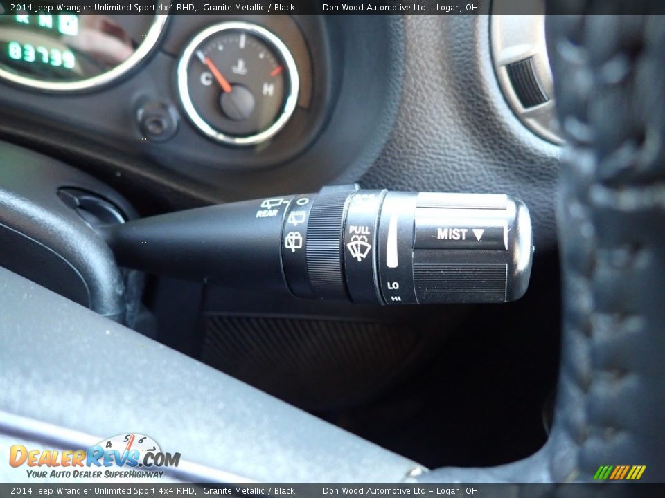 Controls of 2014 Jeep Wrangler Unlimited Sport 4x4 RHD Photo #23