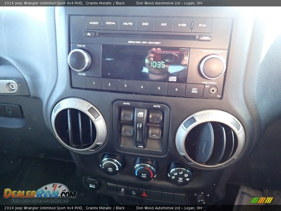 Controls of 2014 Jeep Wrangler Unlimited Sport 4x4 RHD Photo #24