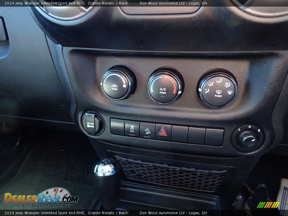 Controls of 2014 Jeep Wrangler Unlimited Sport 4x4 RHD Photo #25