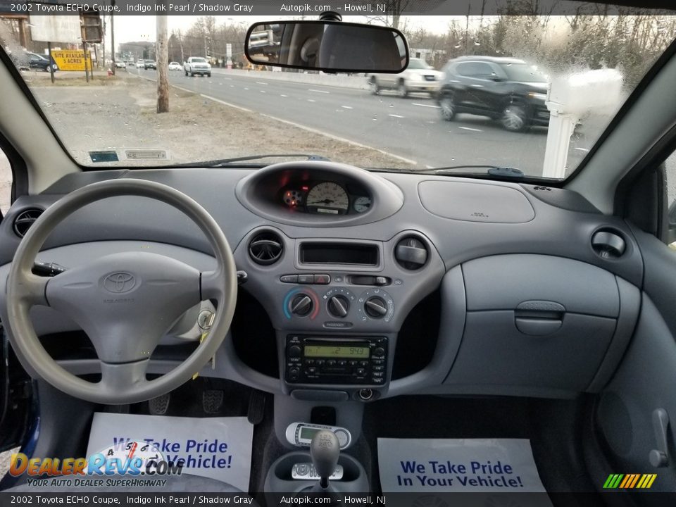 Dashboard of 2002 Toyota ECHO Coupe Photo #8