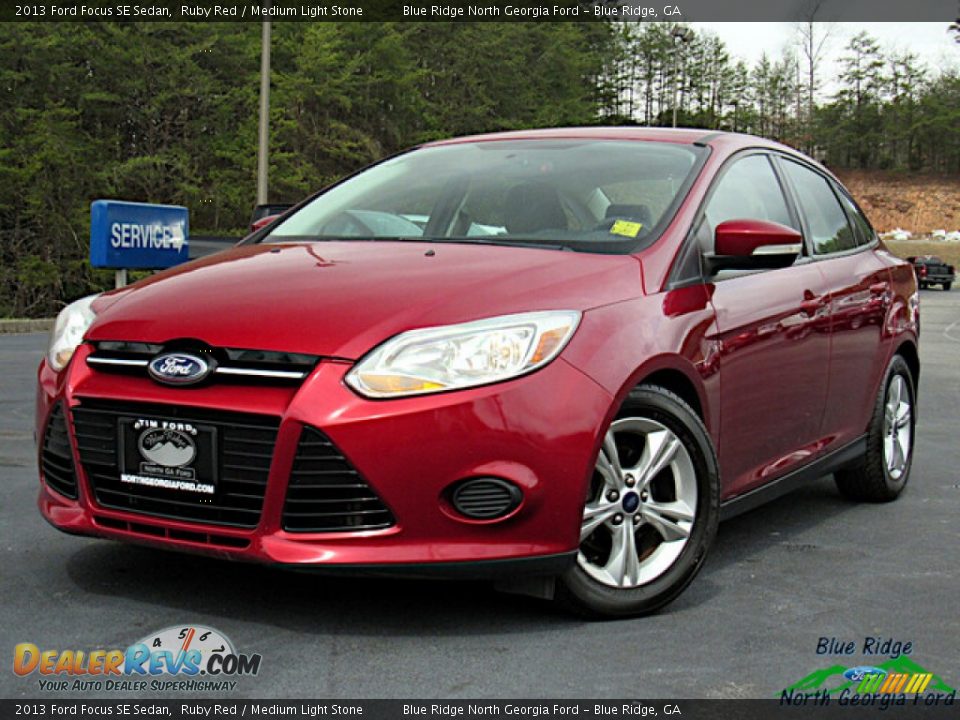 2013 Ford Focus SE Sedan Ruby Red / Medium Light Stone Photo #1