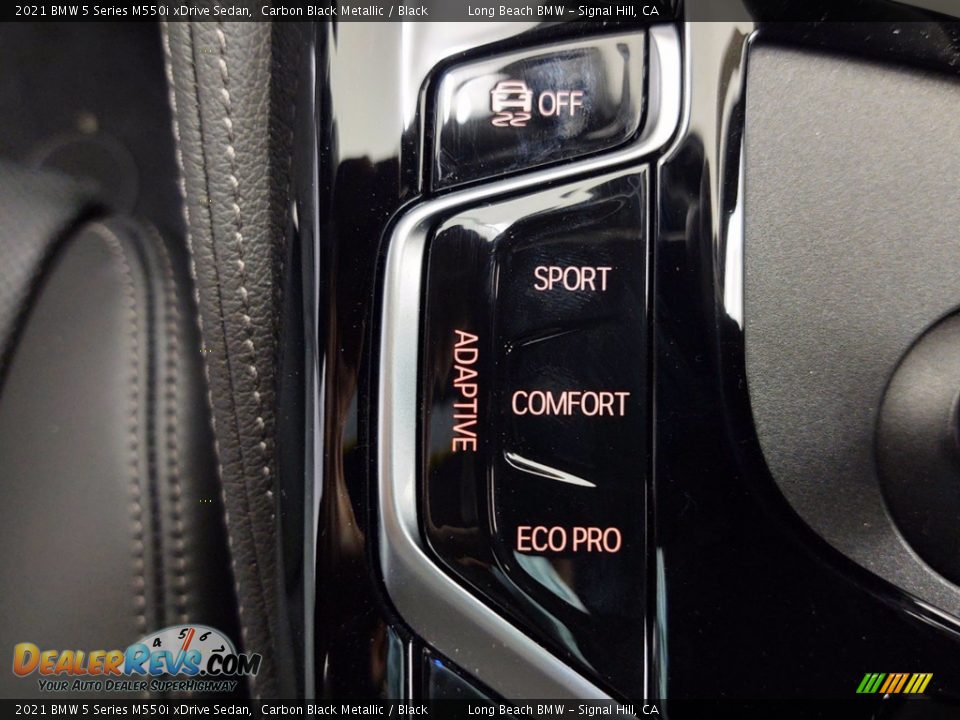 Controls of 2021 BMW 5 Series M550i xDrive Sedan Photo #23
