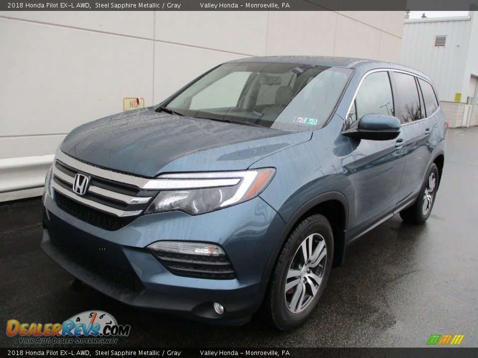 Front 3/4 View of 2018 Honda Pilot EX-L AWD Photo #9
