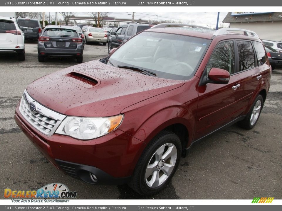 Front 3/4 View of 2011 Subaru Forester 2.5 XT Touring Photo #1
