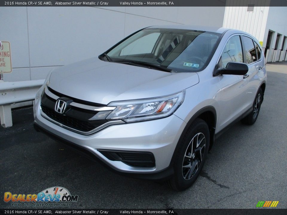 Front 3/4 View of 2016 Honda CR-V SE AWD Photo #9