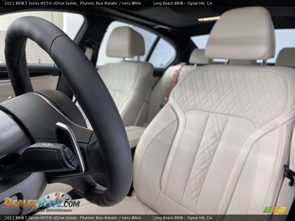 Front Seat of 2021 BMW 5 Series M550i xDrive Sedan Photo #13