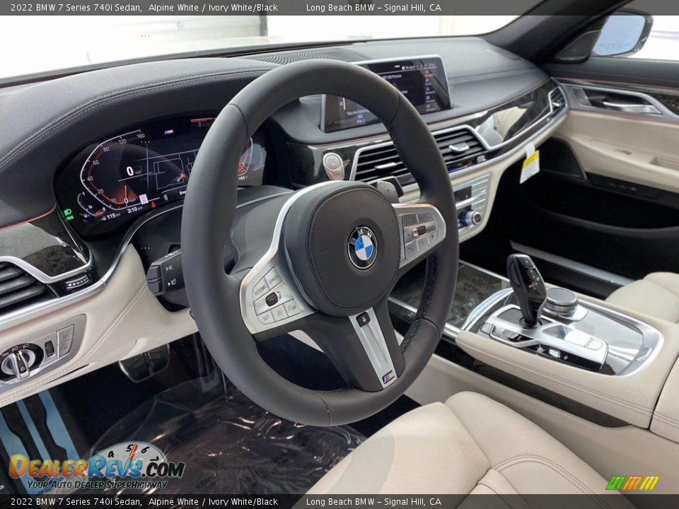 Dashboard of 2022 BMW 7 Series 740i Sedan Photo #12