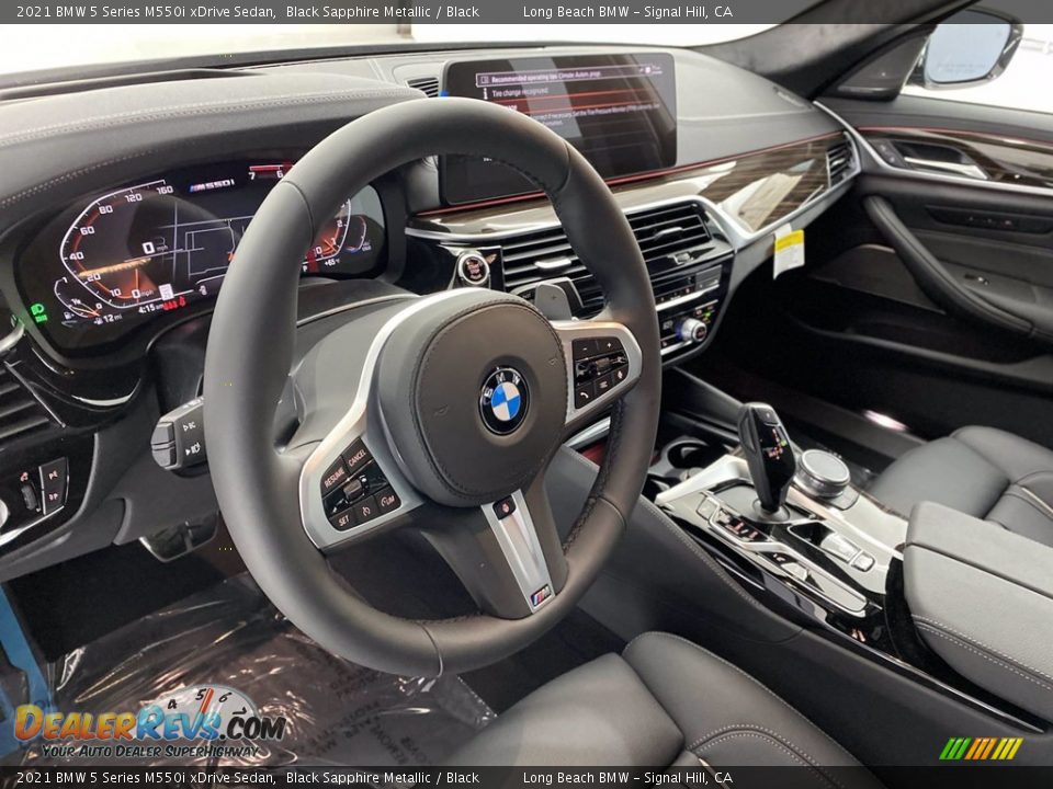 2021 BMW 5 Series M550i xDrive Sedan Steering Wheel Photo #12
