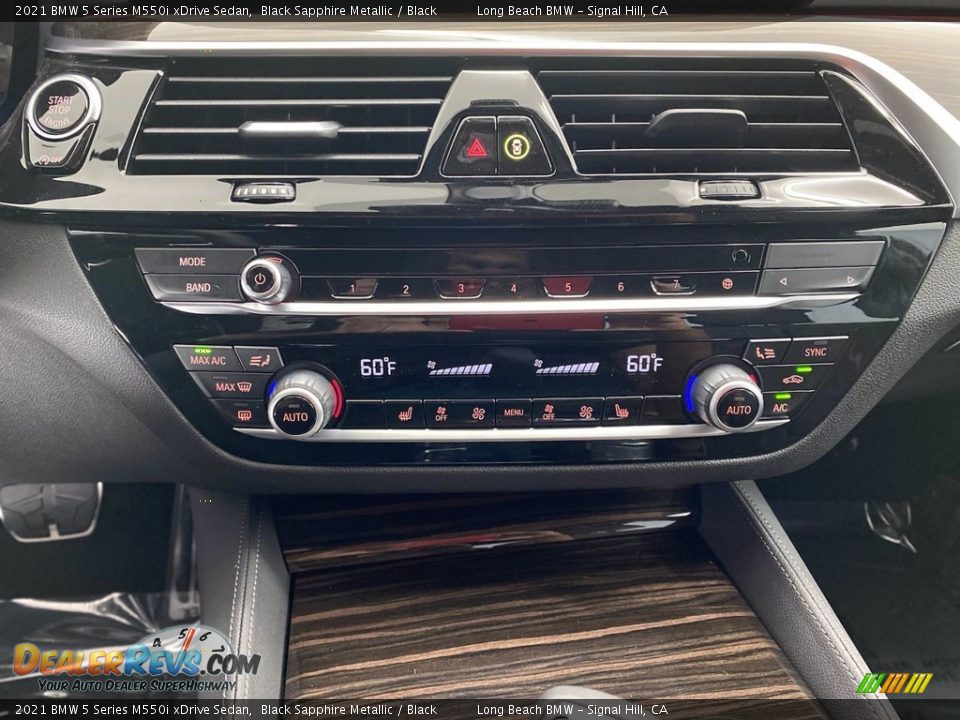 Controls of 2021 BMW 5 Series M550i xDrive Sedan Photo #21