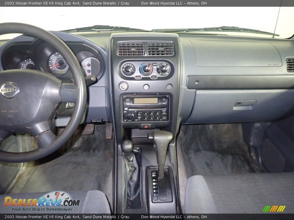 Dashboard of 2003 Nissan Frontier XE V6 King Cab 4x4 Photo #21