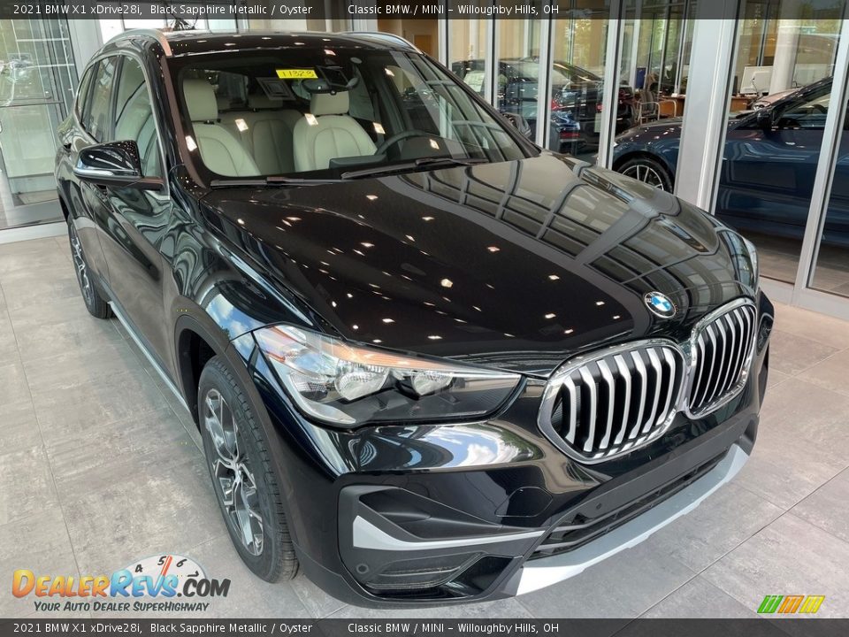 2021 BMW X1 xDrive28i Black Sapphire Metallic / Oyster Photo #1