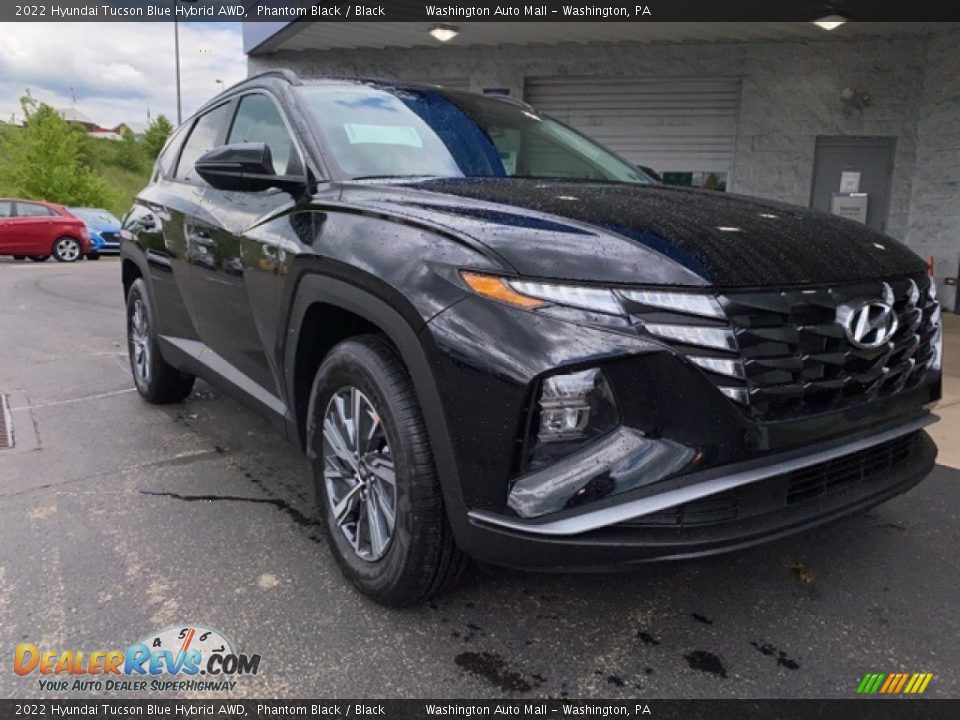 Front 3/4 View of 2022 Hyundai Tucson Blue Hybrid AWD Photo #1