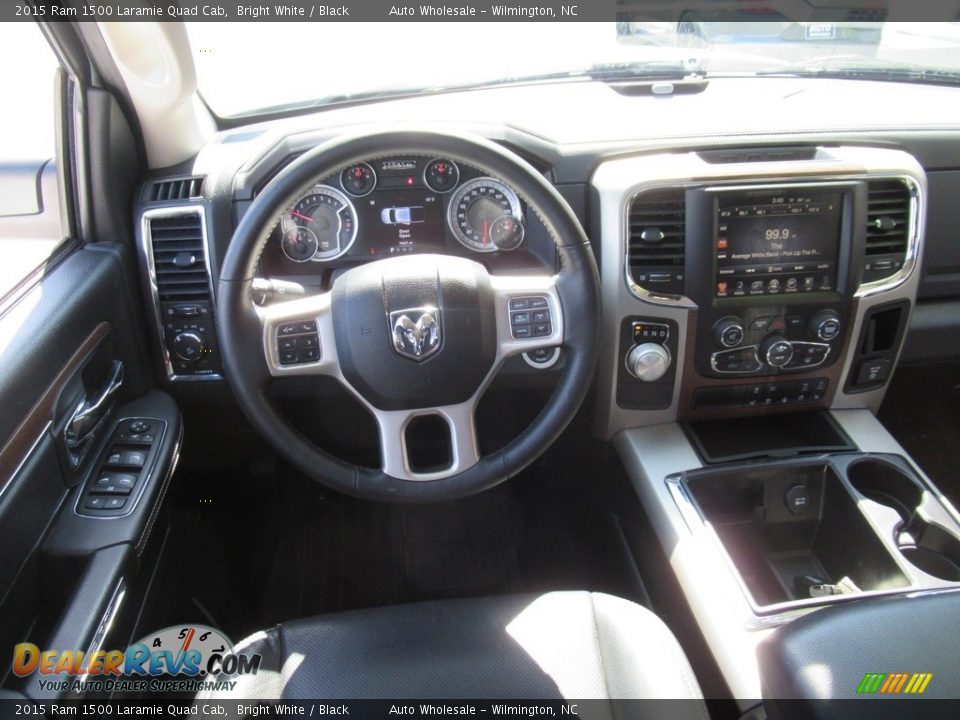 Dashboard of 2015 Ram 1500 Laramie Quad Cab Photo #14