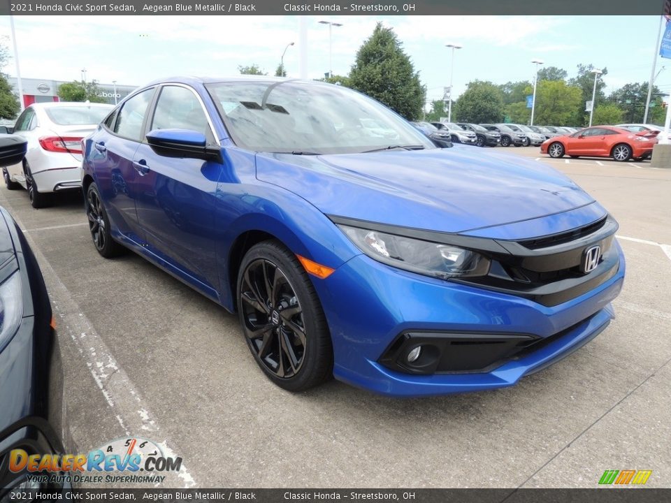 Front 3/4 View of 2021 Honda Civic Sport Sedan Photo #3