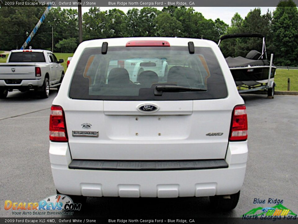 2009 Ford Escape XLS 4WD Oxford White / Stone Photo #4