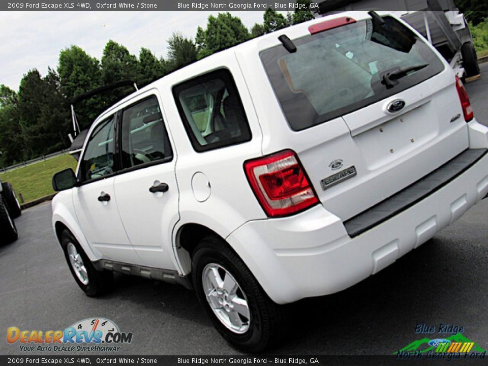 2009 Ford Escape XLS 4WD Oxford White / Stone Photo #25