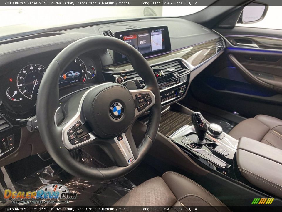 Dashboard of 2018 BMW 5 Series M550i xDrive Sedan Photo #16