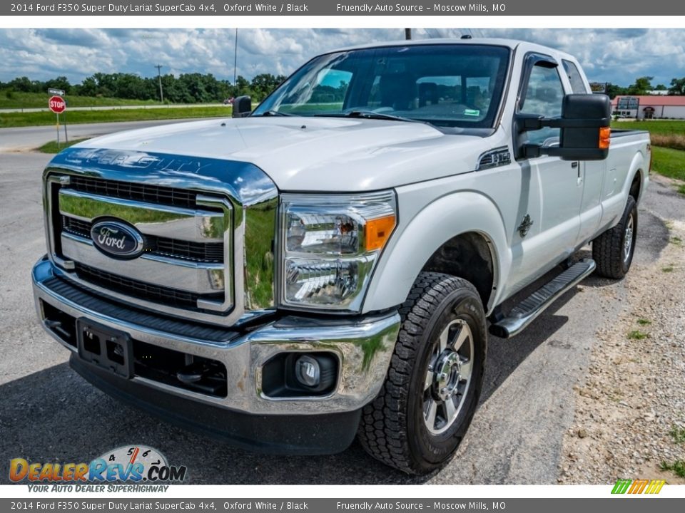Front 3/4 View of 2014 Ford F350 Super Duty Lariat SuperCab 4x4 Photo #8