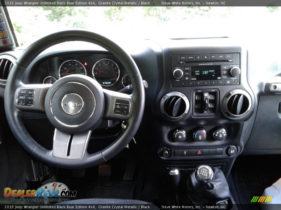 Dashboard of 2016 Jeep Wrangler Unlimited Black Bear Edition 4x4 Photo #21