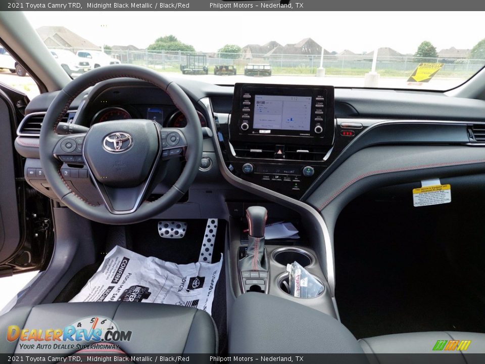 Dashboard of 2021 Toyota Camry TRD Photo #10