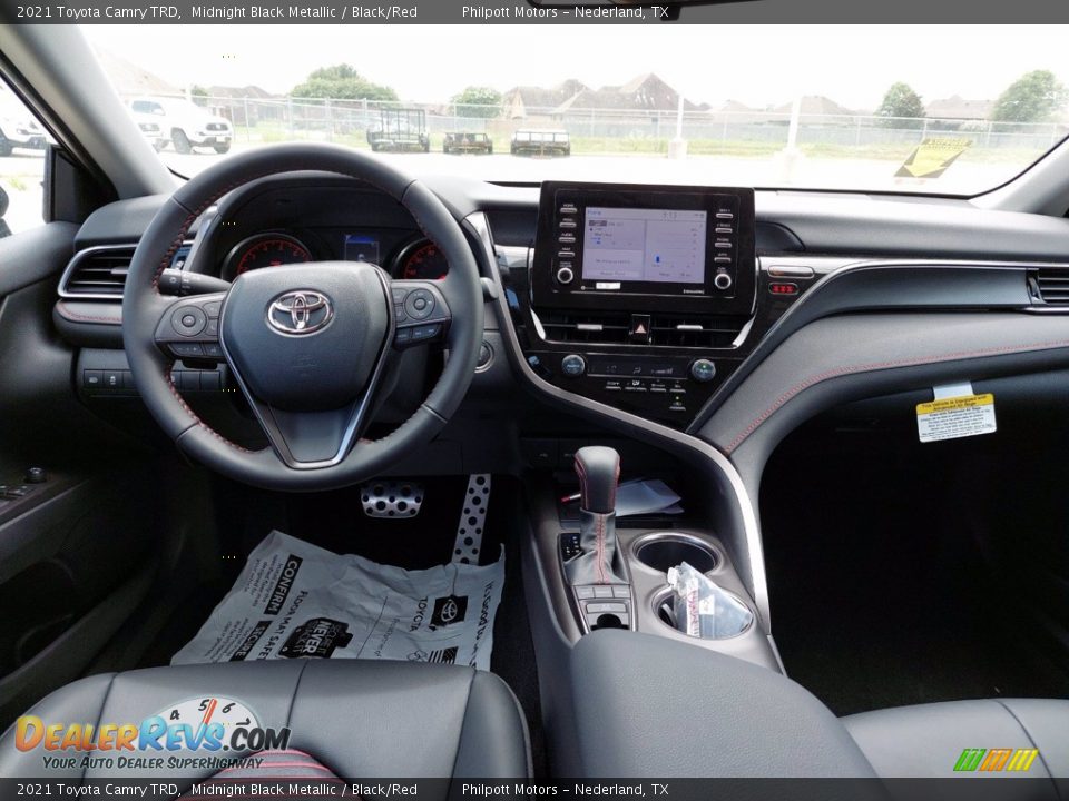 Dashboard of 2021 Toyota Camry TRD Photo #24