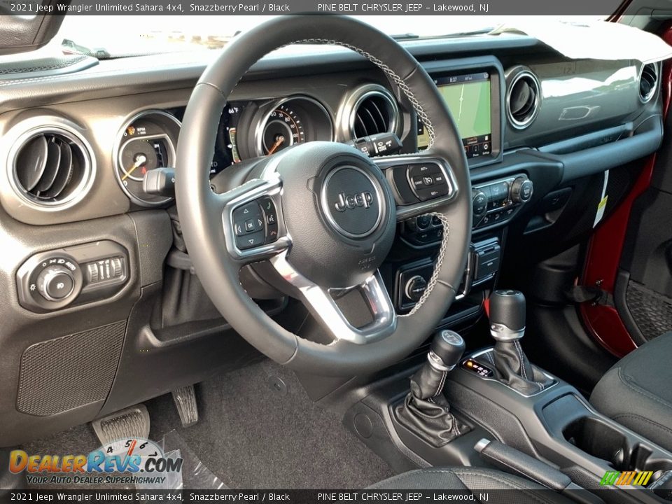 Dashboard of 2021 Jeep Wrangler Unlimited Sahara 4x4 Photo #13